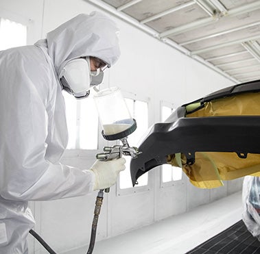 Collision Center Technician Painting a Vehicle | Steet Toyota of Johnstown in Johnstown NY
