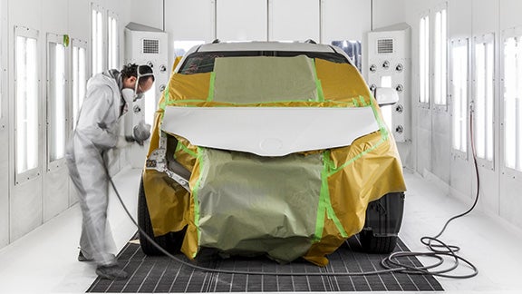 Collision Center Technician Painting a Vehicle | Steet Toyota of Johnstown in Johnstown NY