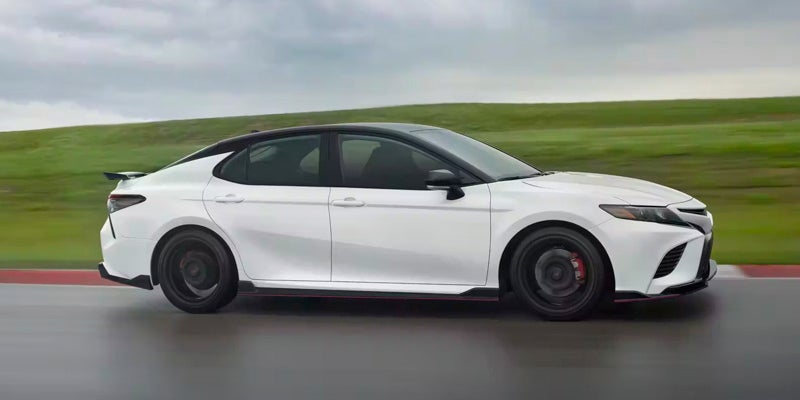 Side view of a white Toyota Camry