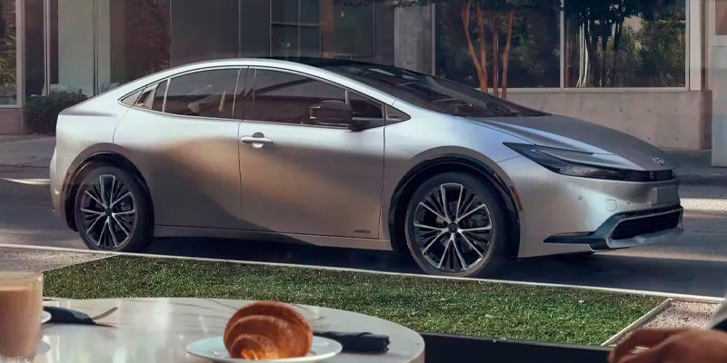 A Toyota Prius parked on the side of a street