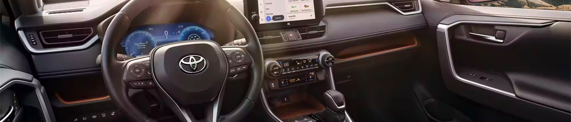 Interior of a 2024 RAV4 showing a steering wheel