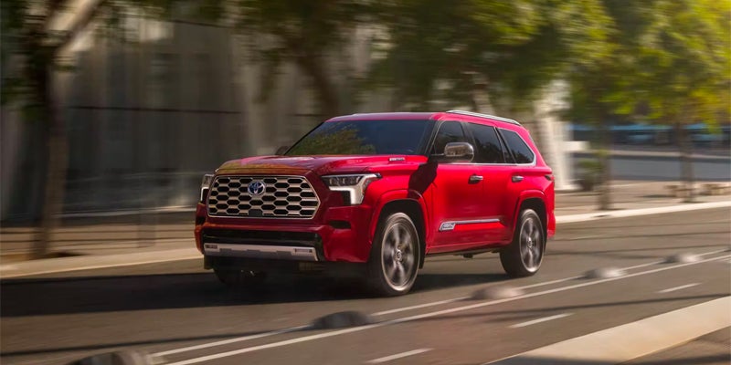 A Toyota Sequoia driving through a city.