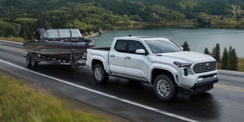 A Toyota Tacoma tows a boat